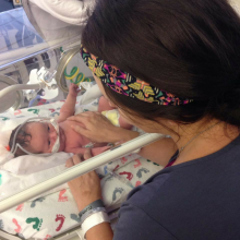 Mother looking at her baby in the NICU