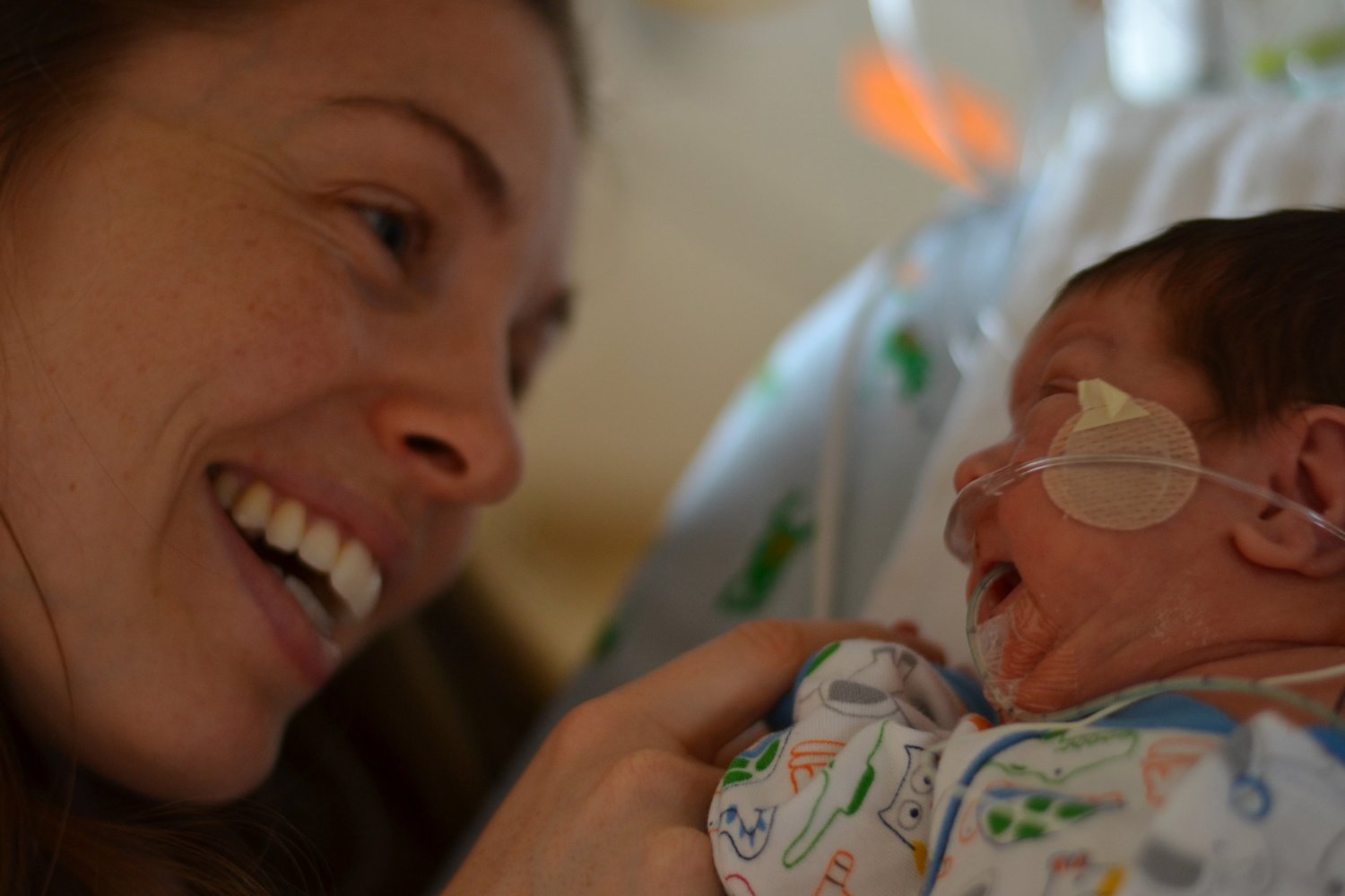 Mother with premature son in NICU