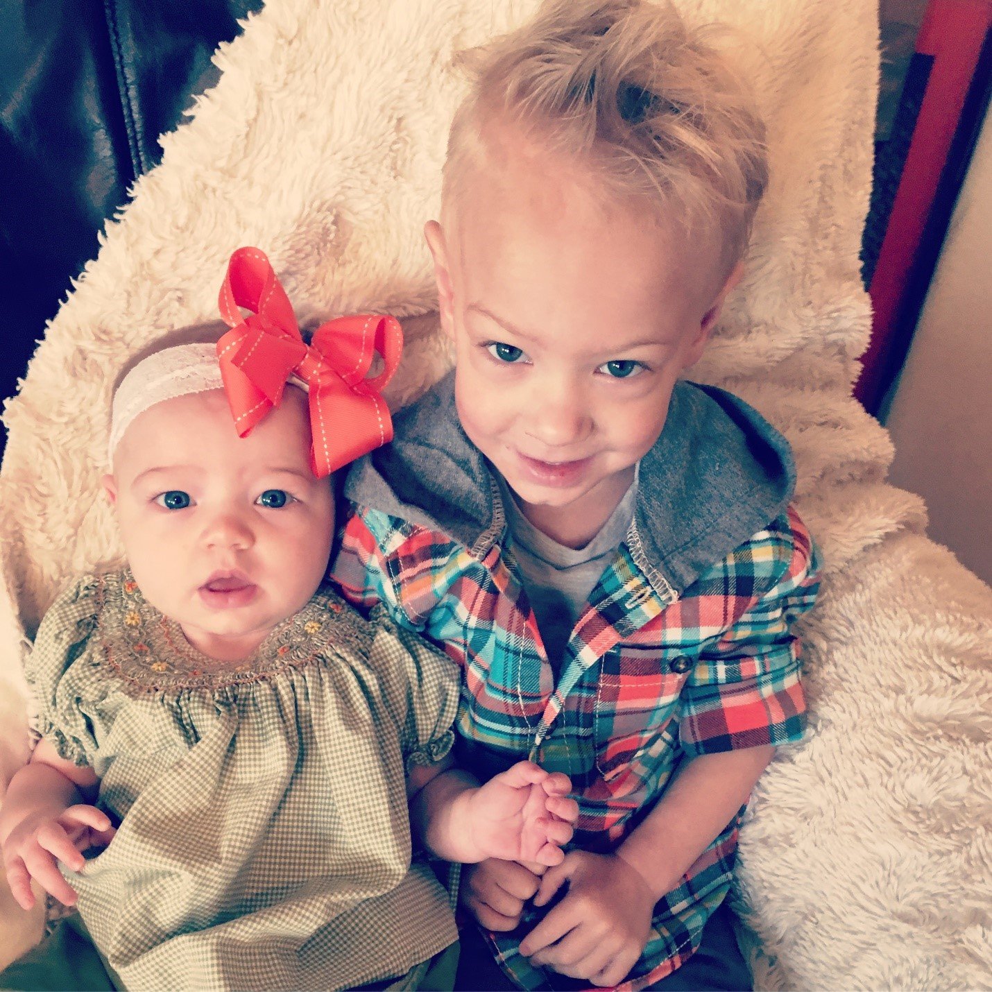 Toddler brother and baby sister