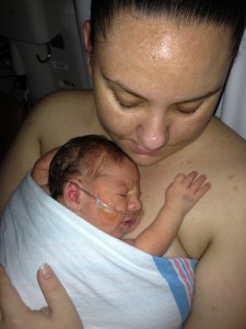 Emmanuel and Mary enjoying skin to skin time in the NICU.