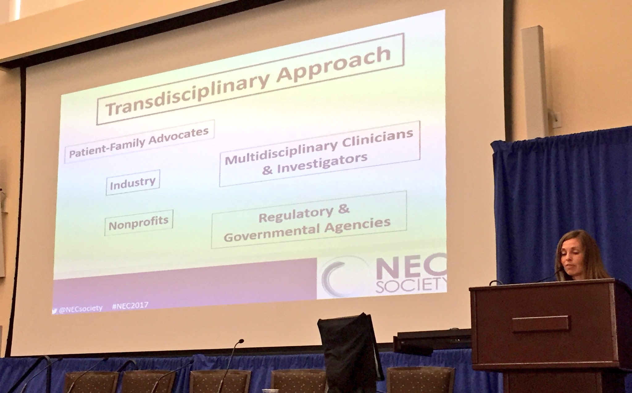 Jennifer Canvasser presents at the NEC Symposium.