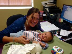 Shaina says, "Bringing Noah to work with me is perfect. I can breastfeed, do the job that I love and get snuggles in between."