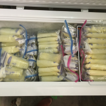 Deep freezer full of breastmilk storage bags