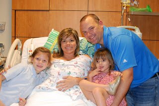 Melissa and family awaiting Ryan's arrival.