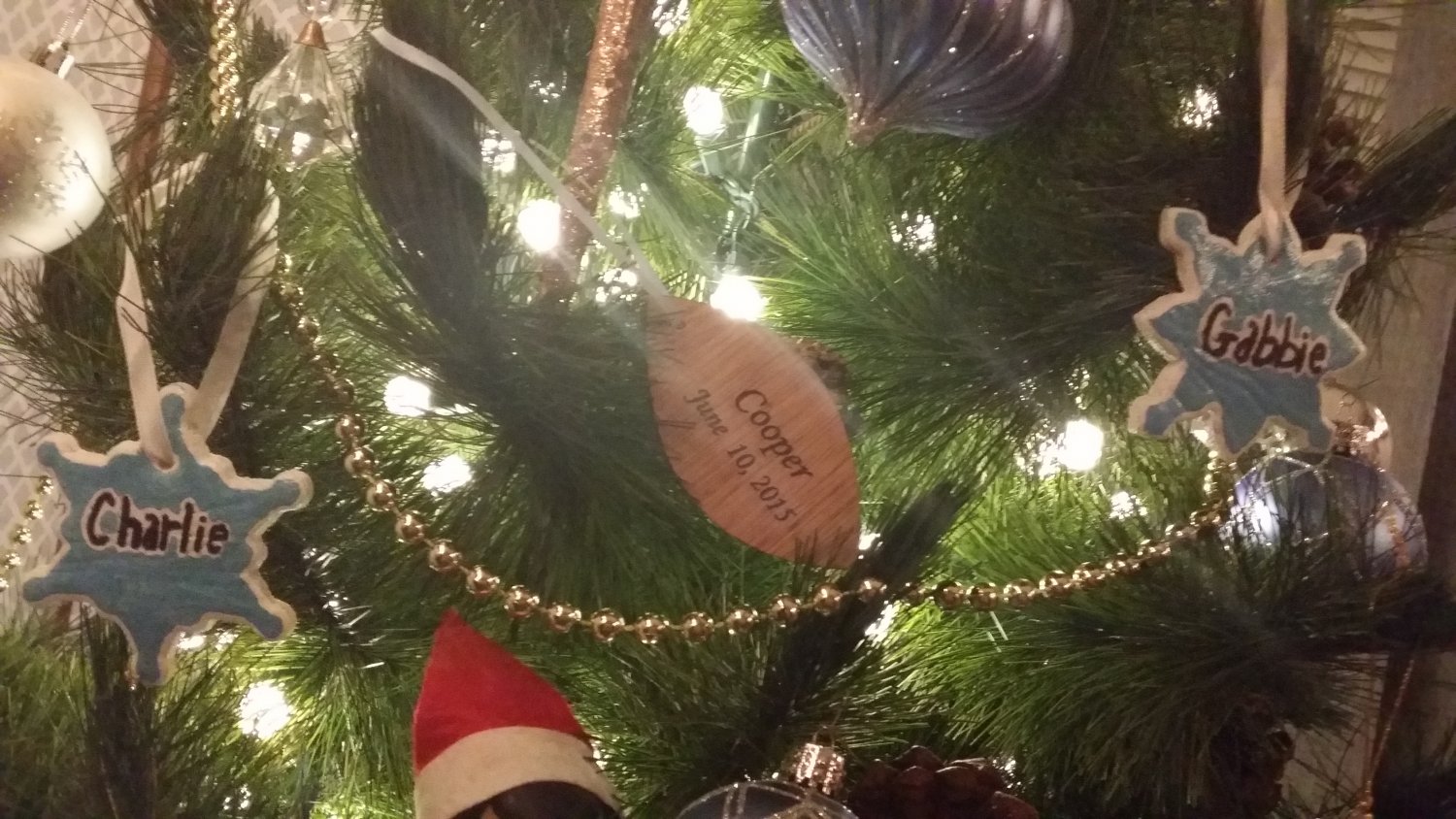 Close-up of Christmas tree with children's ornaments