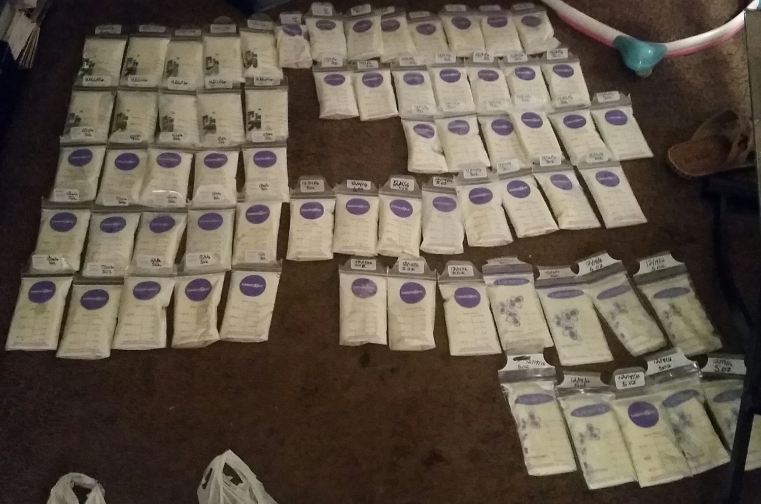 Frozen bags of milk laid out 