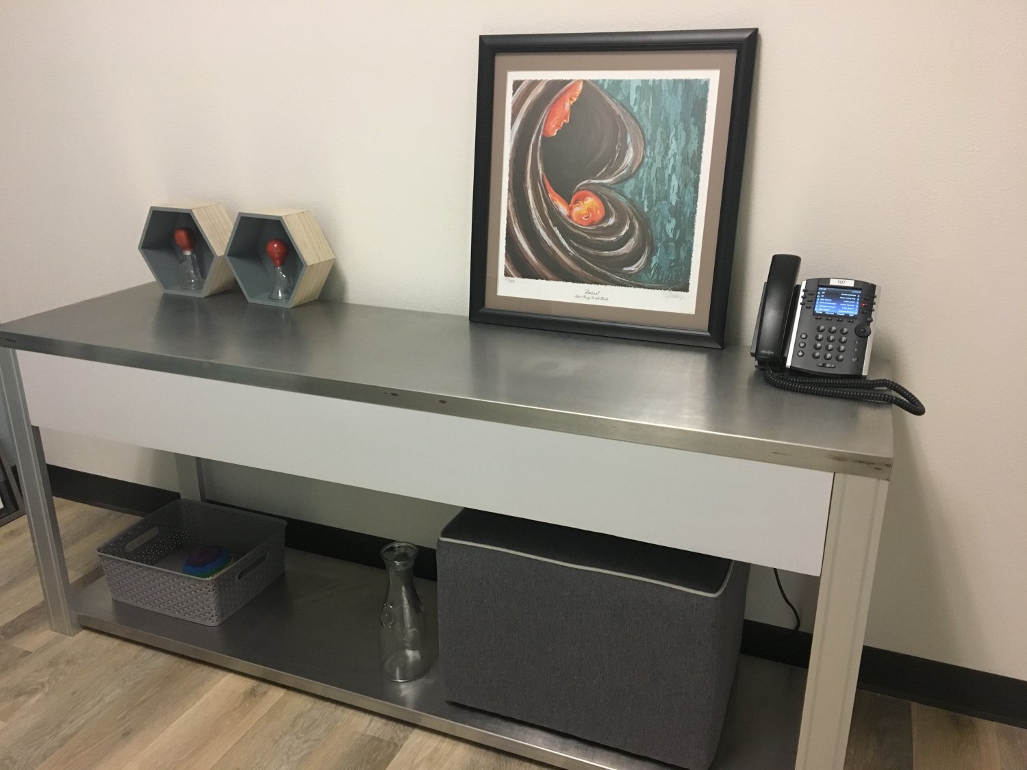 Metal table with decorative items on top