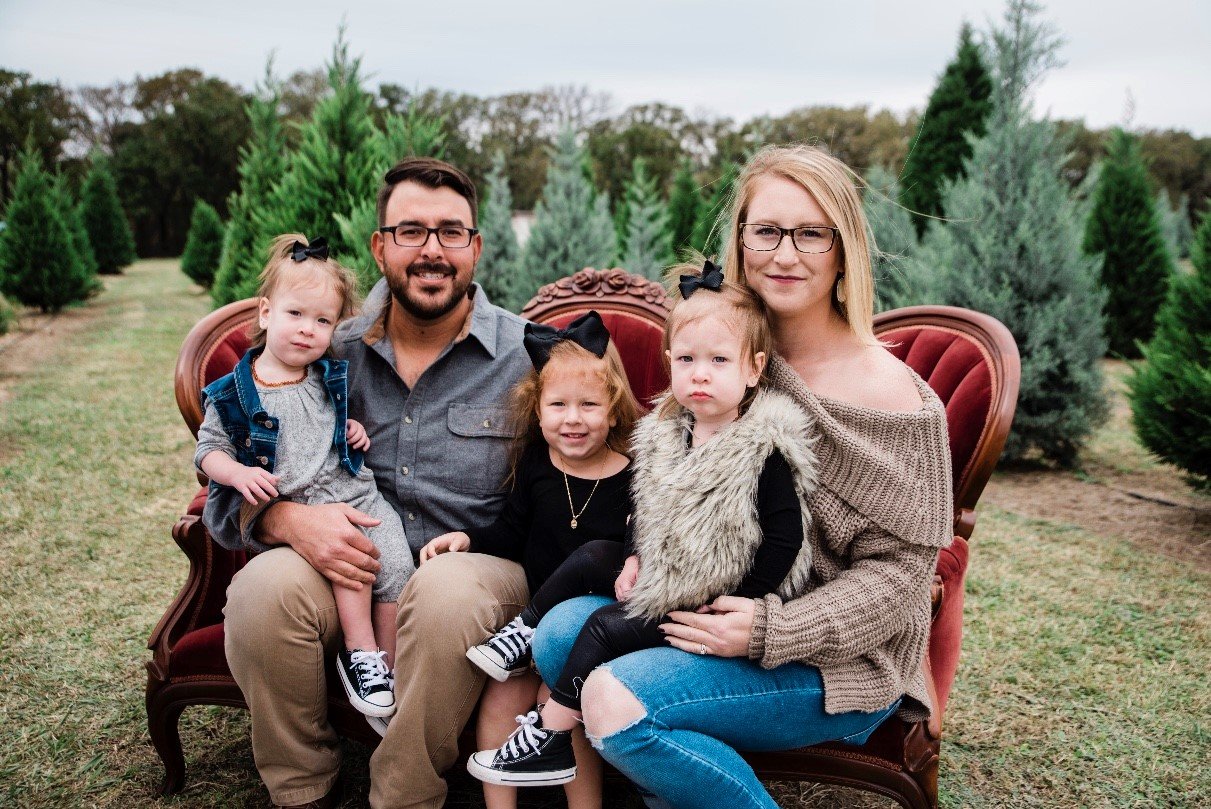 Mother, father, and three young daughters