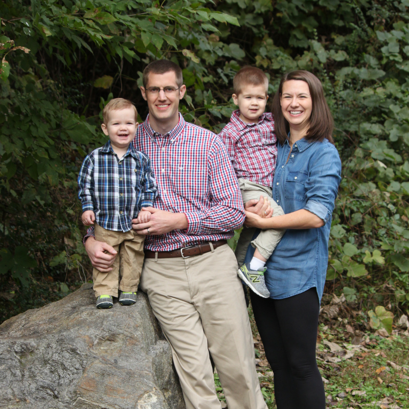 Mother and father with two toddler sons