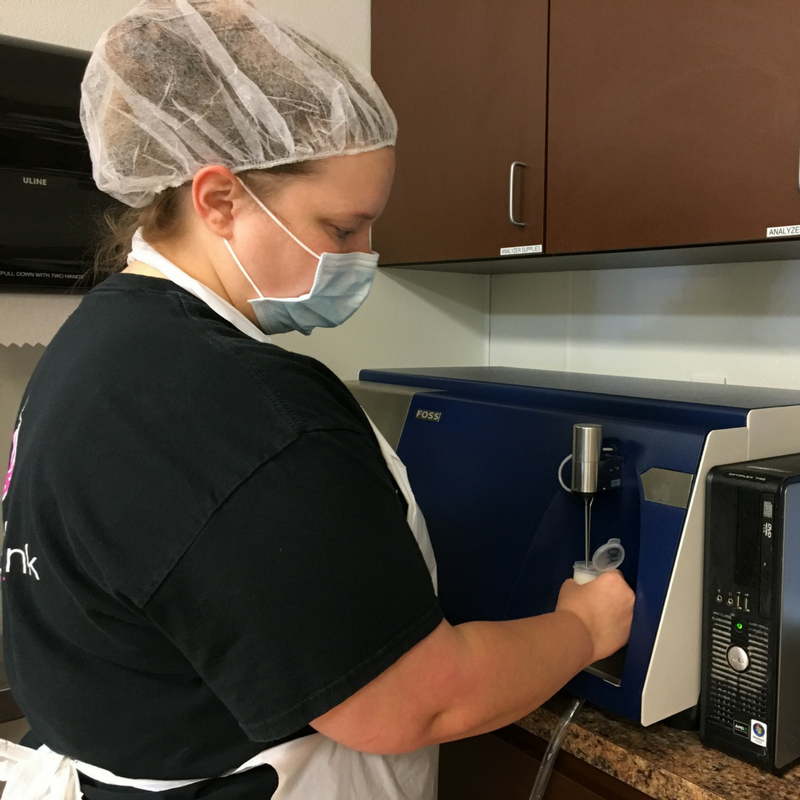 Lab technician running a test on a sample of breast milk