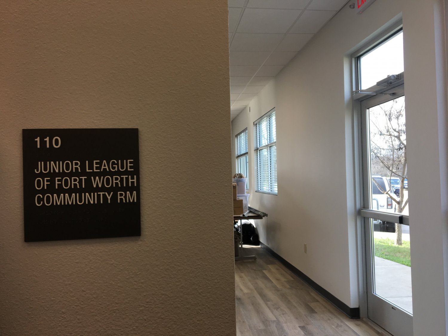 Sign and doorway into a room