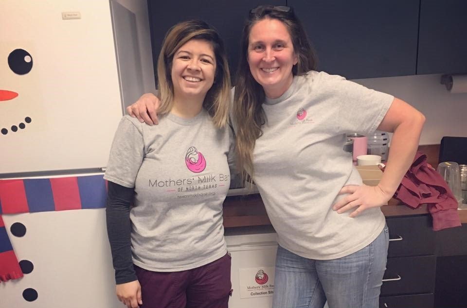 Women standing in front of a freezer