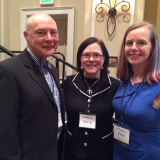 Three health professionals at a conference