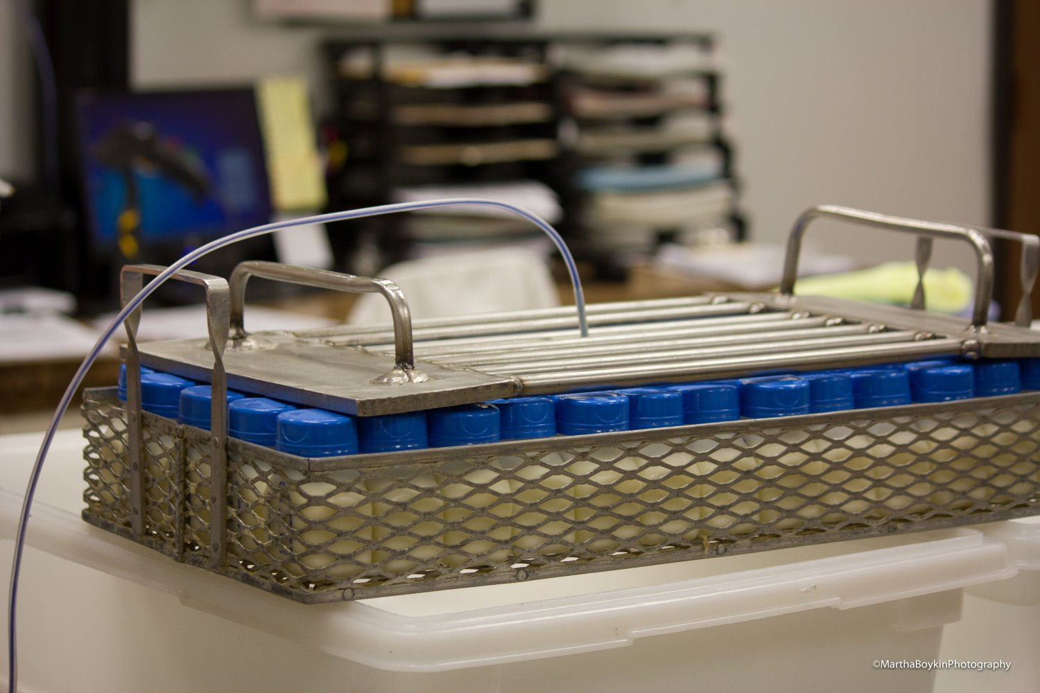 Bottles of pasteurized donor human milk sitting on a tray