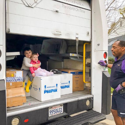 Camden and Saylor getting ready to ship their donation to MMBNT