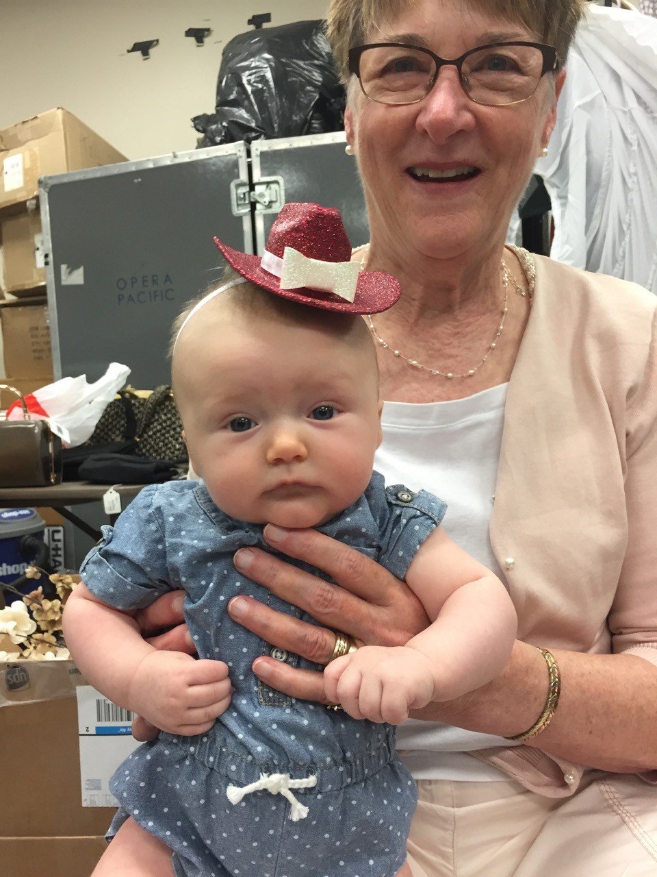 Baby being held by her grandmother