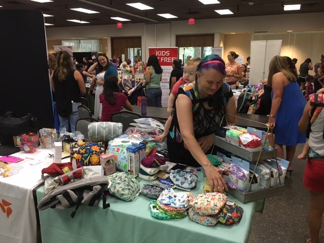 Vendor displays her products at an expo