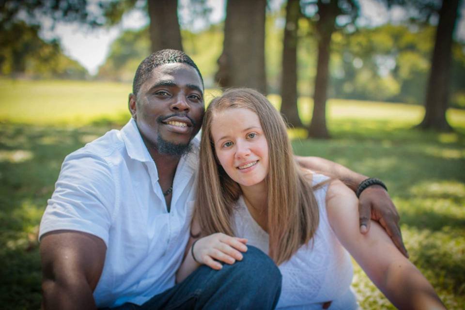 Mother and father sitting outside