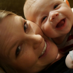 Mother holding infant son